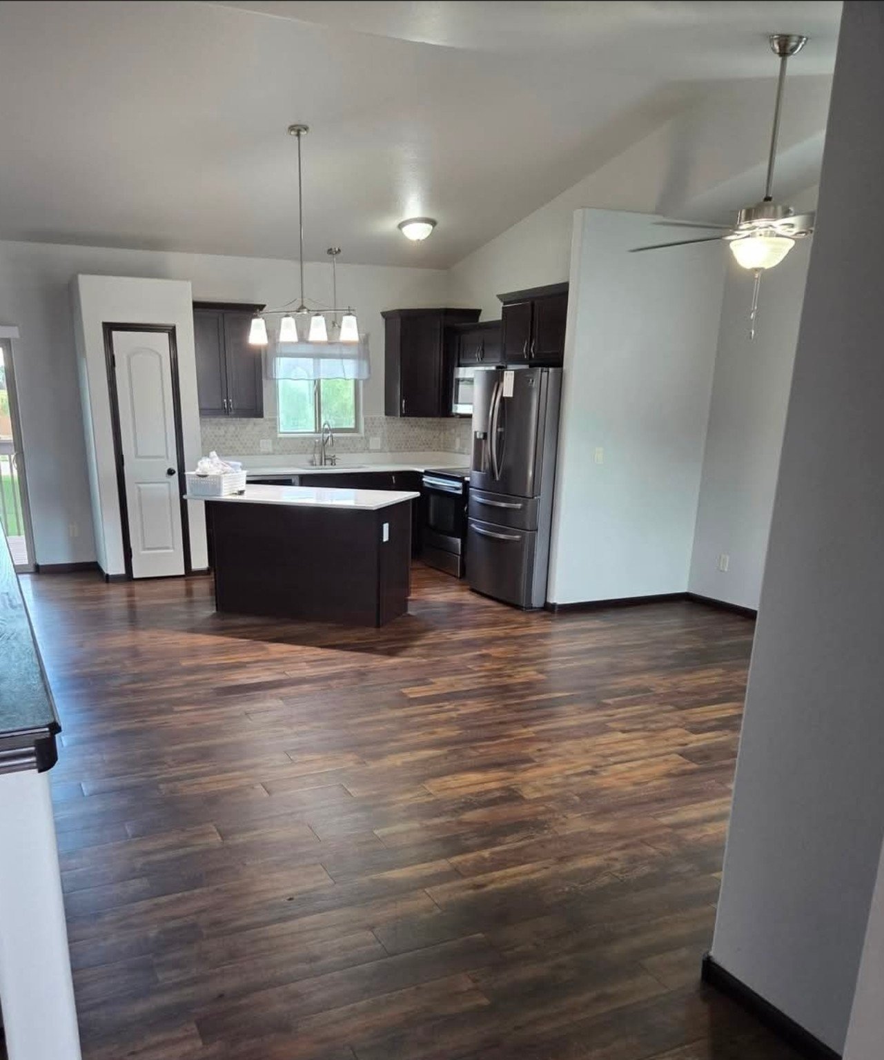 Move-out cleaned kitchen and open floor plan